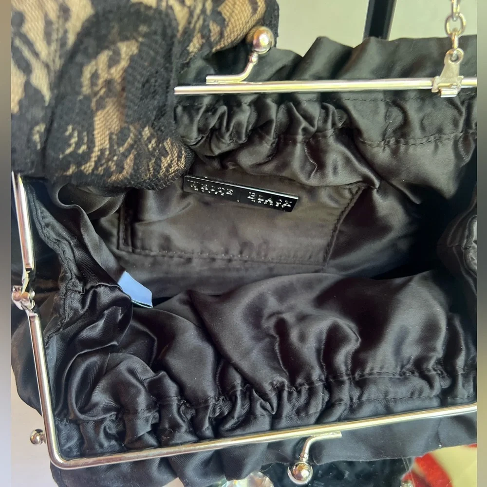 White House black market Chic Black Satin Clutch with Rosette Accent